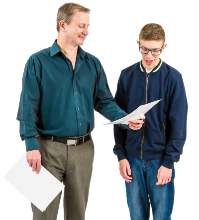 A man showing a young man some information on a piece of paper