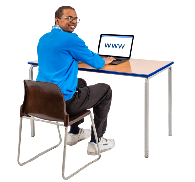 a man sitting looking at the internet on a laptop