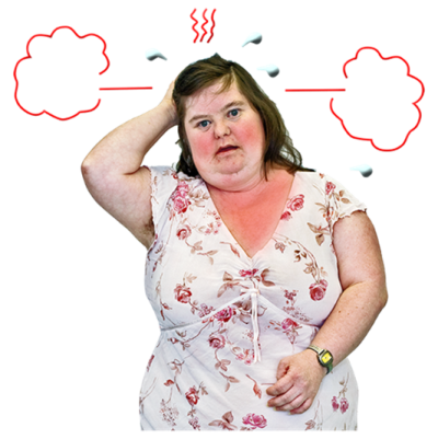 A young woman with a red face looking hot and bothered while holding her hand on her stomach