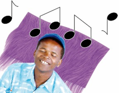 A smiling man with his eyes closed listening to music