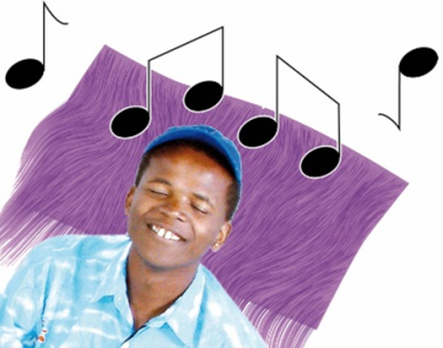 A man with his eyes closed listening to music