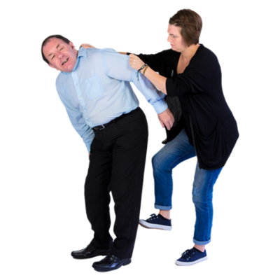 A woman grabbing a man and kicking him